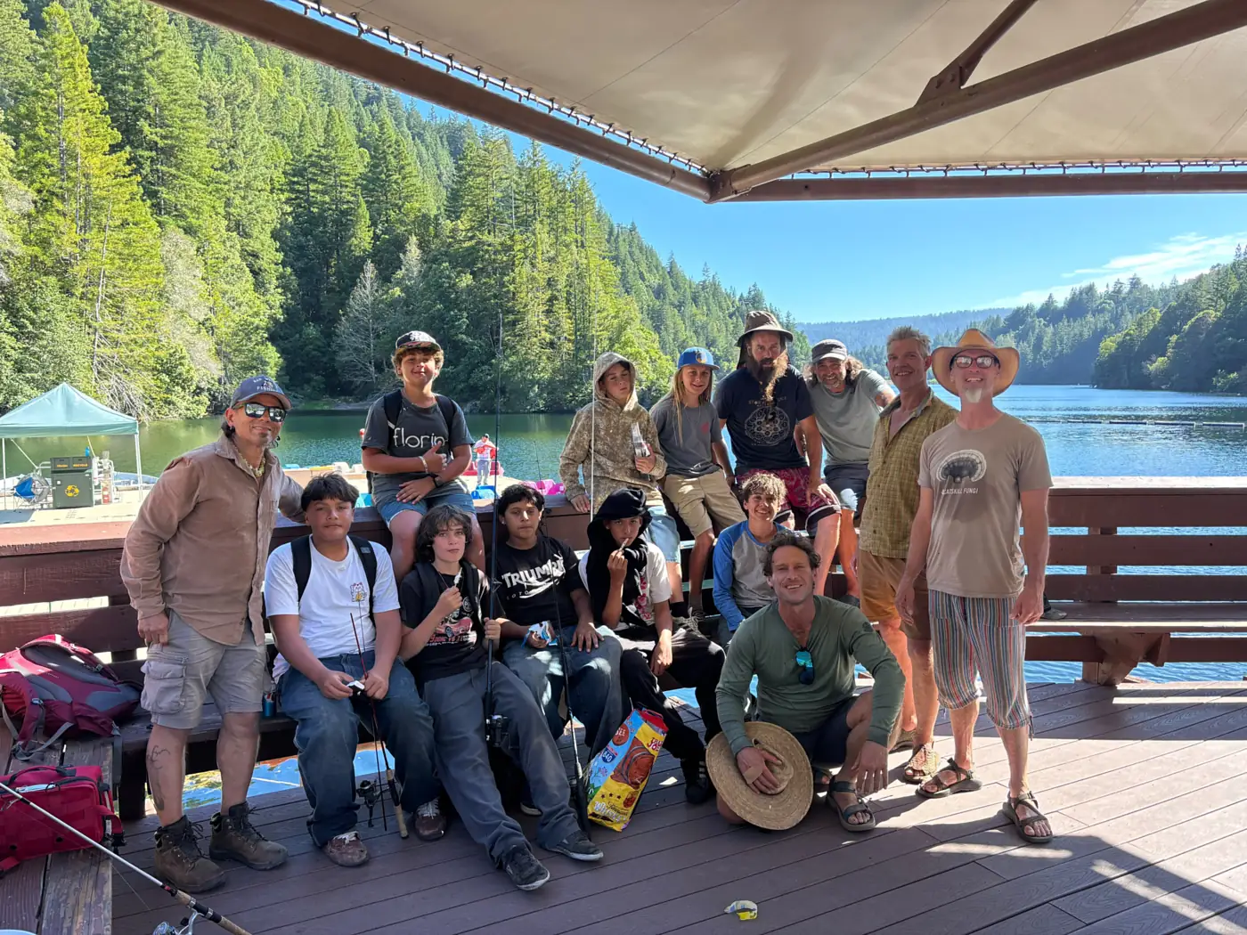 The Fire Keepers boys and their mentors at the reservoir on a summer fishing day